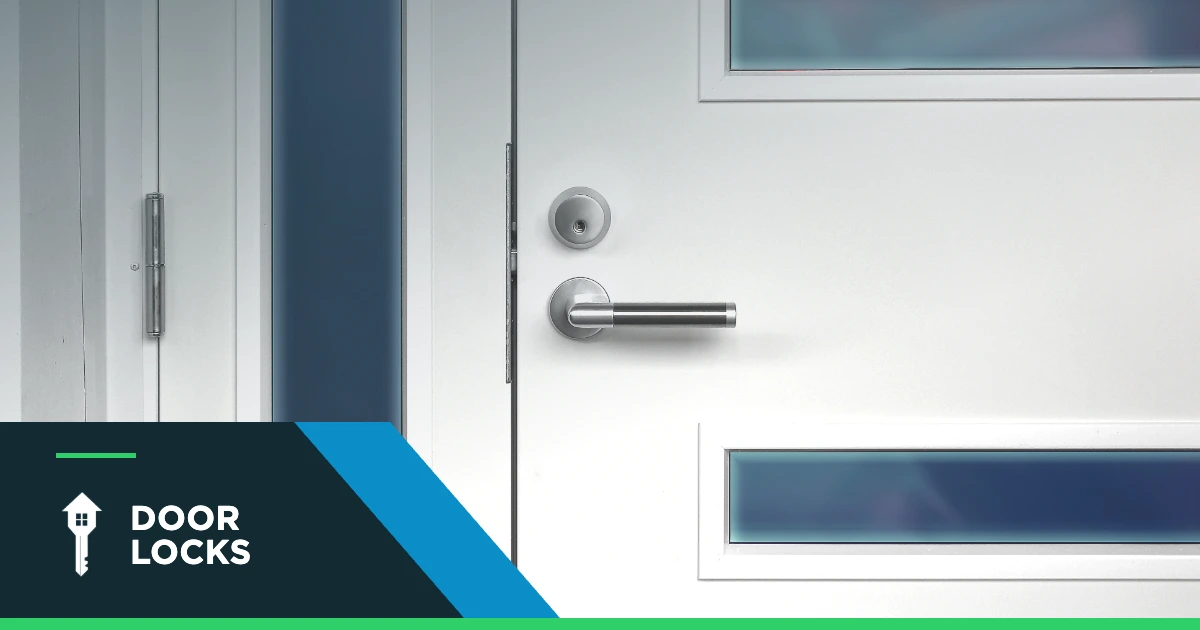 Close-up of a UPVC door handle and multi-point lock mechanism on a white door, labelled Door Locks